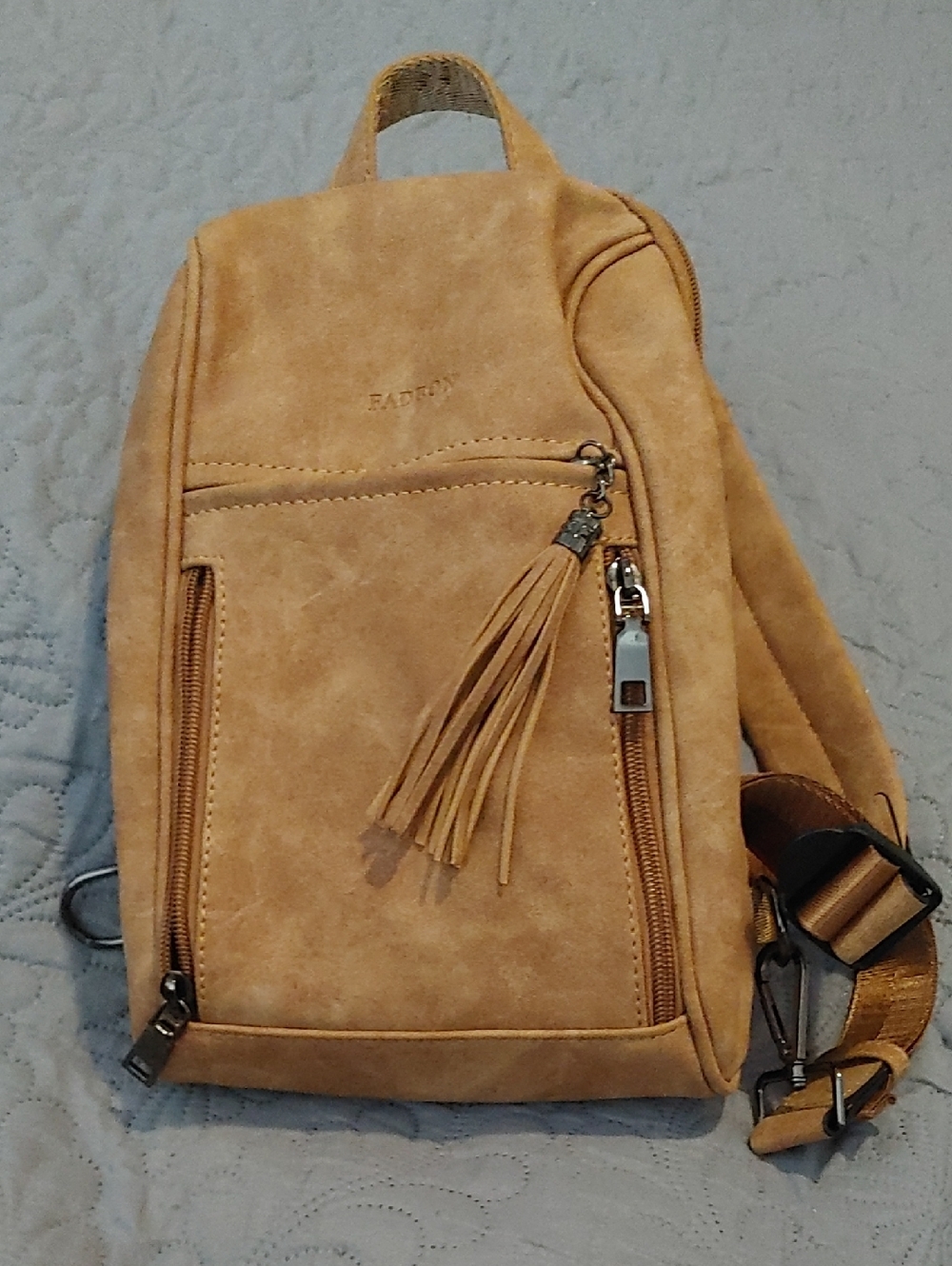 Fadeon Suede Tassel Sling Backpack in Camel